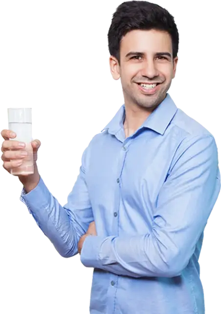 Person Holding a Glass of purified water
